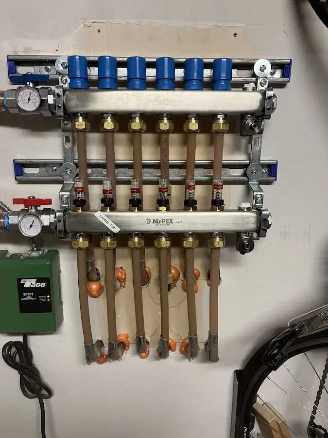 Plumber performing Gas Line Installation at a residential property in Wallace